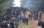 Grodno Region, Belarus. 15th Nov, 2021. Migrants by the Bruzgi - Kuznica checkpoint on the Belarusian-Polish border. The migrant crisis on the border of Belarus with Poland, Lithuania, and Latvia escalated on November 8. Several thousand migrants approach