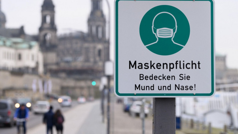semn in limba germana care indica faptul ca masca e obligatorie