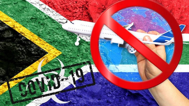 Novel coronavirus disease named COVID - 19, with the flag of South Africa shown against a cracked wall, contains the concept of a ban on air travel be