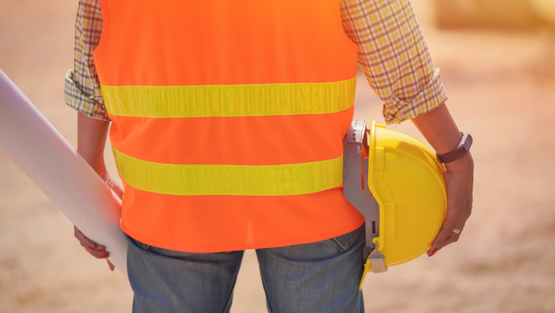 Road construction engineer Looking through the blur of the dust in the shire , Concept for transportation development