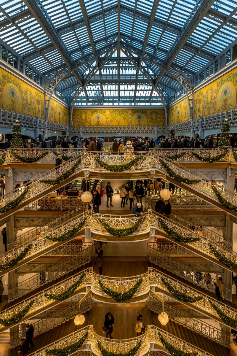 Paris, France - November 28, 2021: Beautiful Christmas decoration in luxury Samaritaine mall in Paris