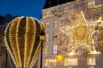 People shopping for Christmas in the chic district of rue du Faubourg Saint Honore.