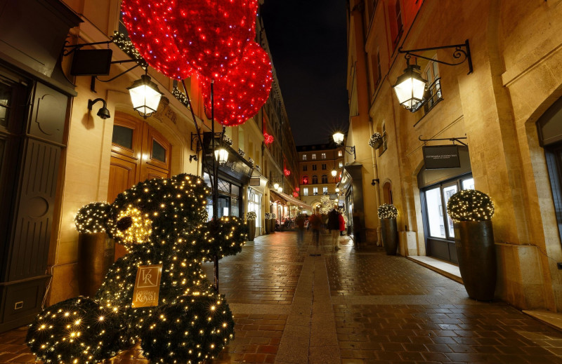 PARIS, FRANCE - November 27 , 2021 : View of Royal Village decorated for Christmas 2021 . Royal Village located near Madeleine in 8th district. This p