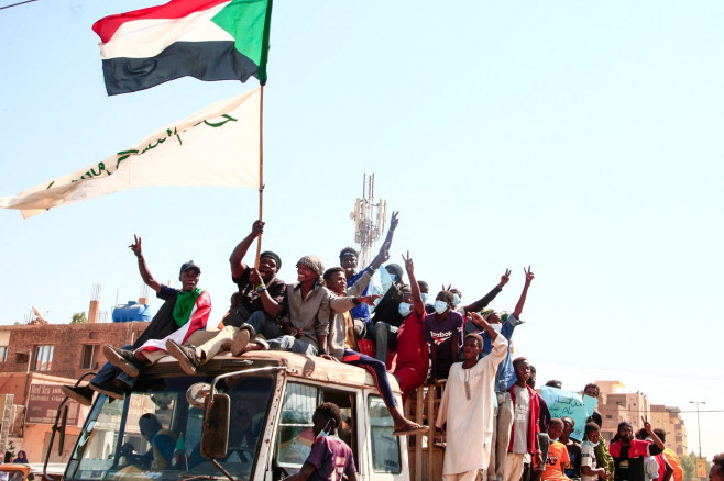 Oameni cu steagul Sudanului