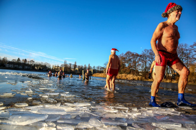 Winter Swimmers Take Christmas Day Dip