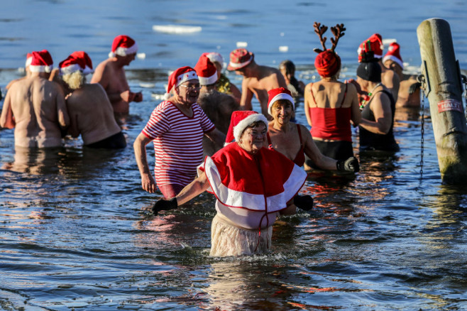 Winter Swimmers Take Christmas Day Dip