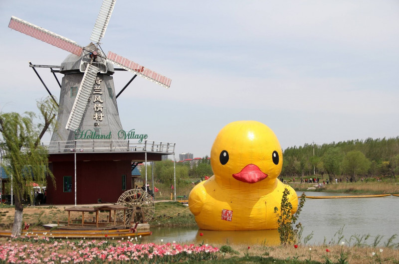 Giant rubber duck on the Qinhuang river, Binzhou, Shandong province, China - 17 Apr 2016
