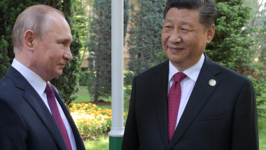 Vladimir Putin și Xi Jinping.