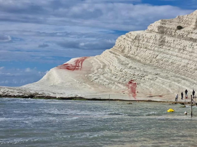 Red Plaster Dust Thrown On White Marl 'Scala Dei Turchi' In Sicily