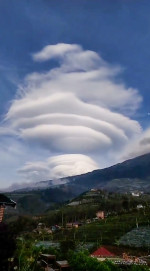 Rare UFO clouds form over mountains in Indonesia