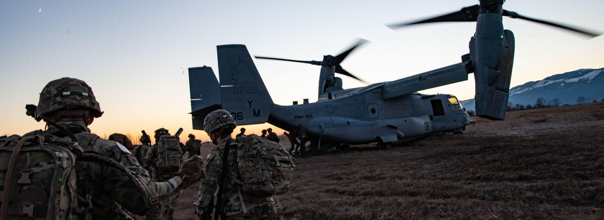 U.S. Army paratroopers assigned to 1st Battalion, 503rd Parachute Infantry Regiment load a V-22 Osprey aircraft from the 2nd Marine Aircraft Wing for extraction from their objective. This training is part of the North and West African Response Force valid
