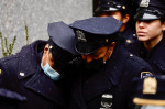 Thousands of NYPD officers bring fifth Avenue to halt to honor fallen colleague Officer Jason Rivera 22, who was gunned down in cold blood in Harlem