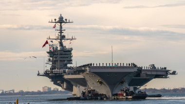 NORFOLK (December 1, 2021) Nimitz-class aircraft carrier USS Harry S. Truman (CVN 75) departs Naval Station Norfolk as part of Harry S. Truman Carrier Strike Groups (HSTCSG) deployment in support of maritime security operations and theater security cooper