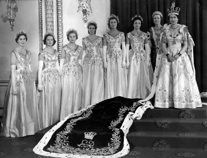 Her Majesty Queen Elizabeth II photographed in the Throne Room of Buckingham Palace with her Maid of Honour after the Coronation 2 Junne 1953