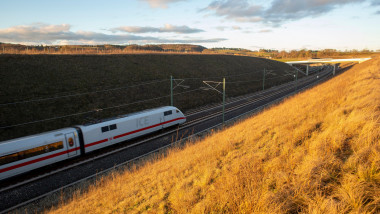 Coburg, Germany. January 6, 2022. A Deutsche Bahn ICE train speeds across Bavaria in beautiful light this evening as Deutsche Bahn announces a conside