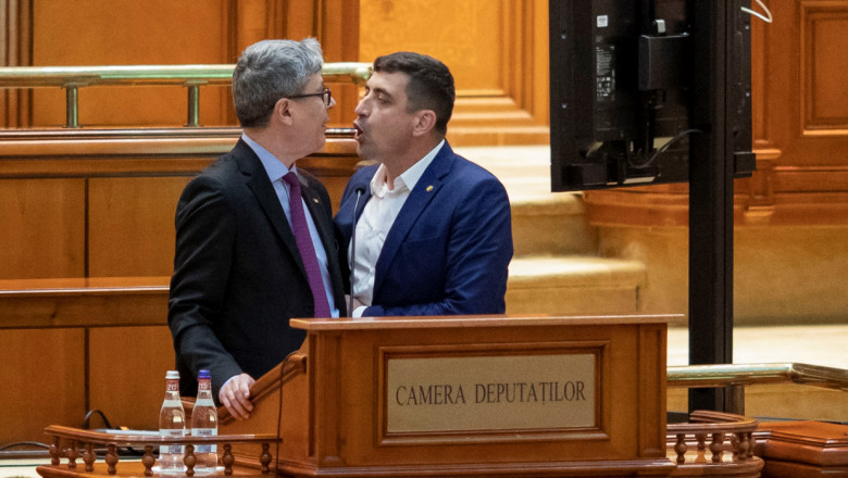 George Simion îl agresează pe Virgil Popescu în Parlament.