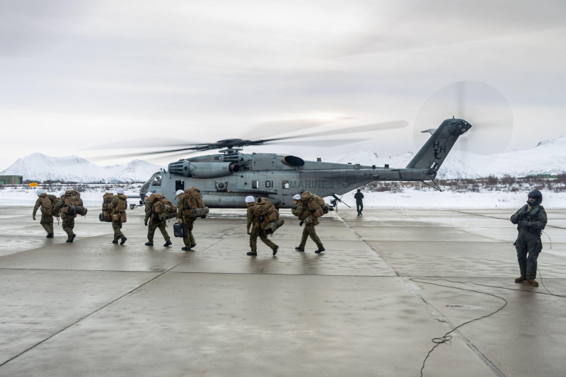 U.S. Marines with 2nd Low Altitude Air Defense Battalion exit a CH-53E Super Stallion assigned to Marine Heavy Helicopter Squadron 366, Andoya, Norway, March 8, 2022. Exercise Cold Response 2022 is a biennial exercise that takes place across Norway, with