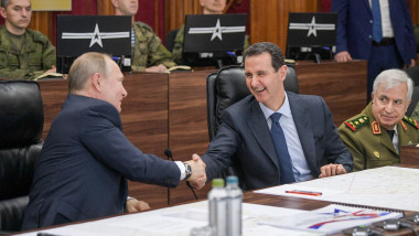 Vladimir Putin dă mâna cu Basshar al-Assad