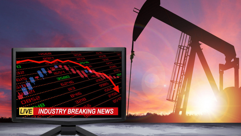 Live oil industry breaking news on TV screen with stock and financial indicators showing energy related industry in crisis due to Covid-19 coronavirus