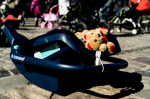 Strollers seen in Rynok Square in memory and honour of the 109 children killed by the war in Ukraine - 18 Mar 2022