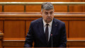Marcel Ciolacu vorbește la tribuna Parlamentului.