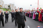 Ri Chun Hee, alături de liderul nord-coreean, Kim Jong-un. 3