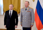President Vladimir Putin presents state awards to officers who took part in counter-terrorism operation in Syria