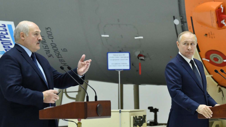 Belarusian President Alexander Lukashenko and Russian President Vladimir Putin give a joint press conference at an assembly and test facility at the Vostochny Cosmodrome