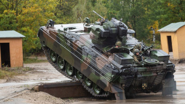 A Bundeswehr Marder infantry fighting vehicle built by Rheinmetall Landsysteme drives over an obstacle during the Land Operations 2019 information training exercise