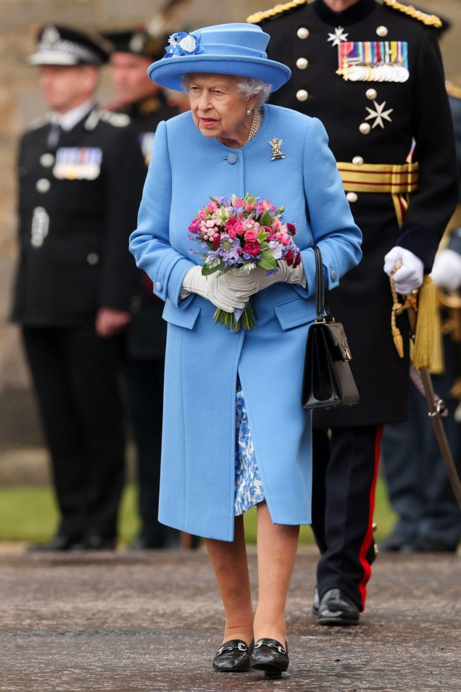 Queen Elizabeth II during the Ceremony of the Keys on the forecourt of the Palace of Holyroodhouse in Edinburgh, as part of her traditional trip to Scotland for Holyrood Week. Picture date: Monday June 28, 2021.