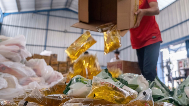 State Logistics Agency (BULOG) prepares affordable basic food packages for people in Kendari, Indonesia - 14 Apr 2022