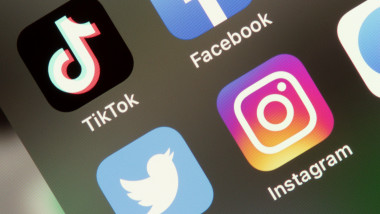Tiktok and Instagram, Facebook and Twitter application on screen Apple iPhone X.