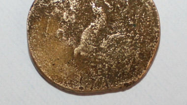 moneda 1