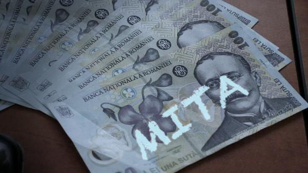 Comisar-şef de poliție, prins în flagrant când primea 10.000 de lei mită în parcarea unui fast-food din Giurgiu