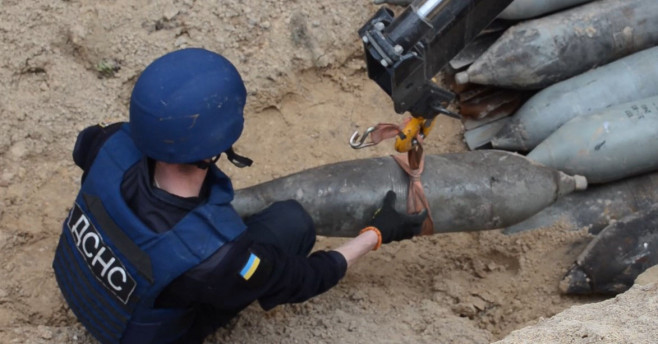 Ukraine`s Hero Dog Patron Digging For Unexploded Munitions