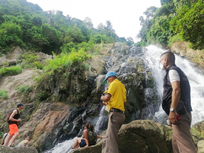 Tourist taking a SELFIE plunges to her death on Thai waterfall