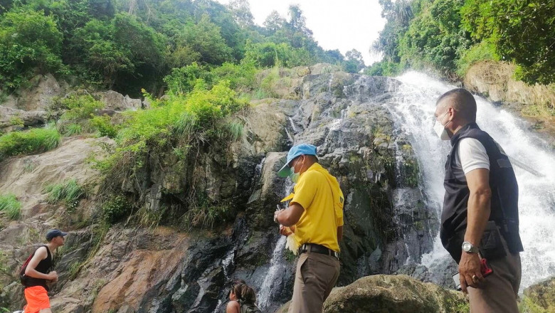 Tourist taking a SELFIE plunges to her death on Thai waterfall