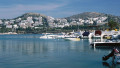 Greece, Athens, Glyfada, yachts moored in harbor surrounded by hotels built into hillside