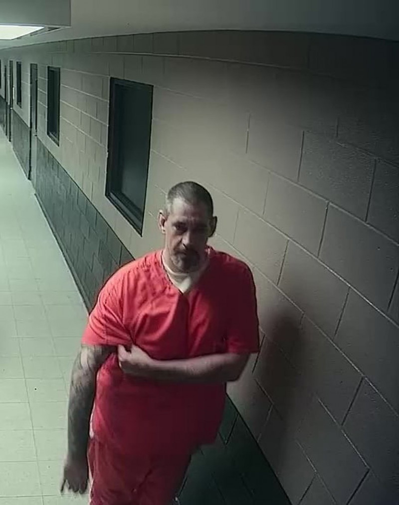 Surveillance camera stills of fugitive prisoner Casey White, believed to have escaped with help from missing female guard