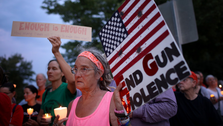 Vigil Held Outside NRA HQ For Mass Shooting Victims In Dayton And El Paso