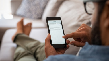 Man reading email on smartphone