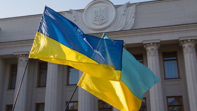 Ukrainian flags are developing near the parliament building. Ukraine