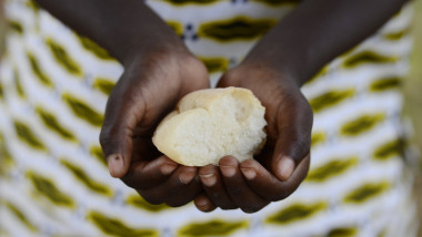 African Hands Cupped Holding Bread - Survival in Africa Symbol