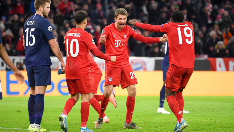 MUNICH, GERMANY - DECEMBER 11: Thomas Muller of FC Bayern Munich celebrates after scoring his team's second goal with Philippe Coutinho and Alphonso Davies during the UEFA Champions League group B match between Bayern Muenchen and Tottenham Hotspur at Allianz Arena on December 11, 2019 in Munich, Germany. (Photo by Michael Regan/Getty Images)