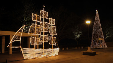 Christmas ship and tree at night