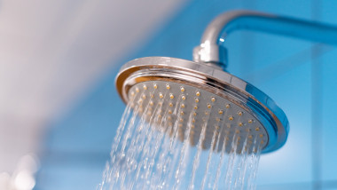 Shower head with refreshing cold water. Water supply is turned on