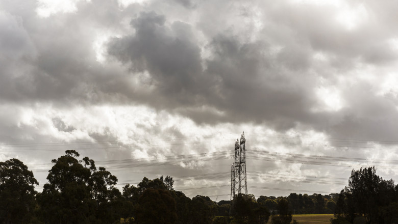 Overcast Cloudscape Moving Across Industrial Landscape Below