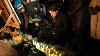 OTTAWA, ON - JANUARY 09: Justin Trudeau Prime Minister of Canada place a candle on Parliament Hill during vigil for the victims who were killed in a plane crash in Iran on January 9, 2020 in Ottawa, Canada. (Photo by Dave Chan/Getty Images)