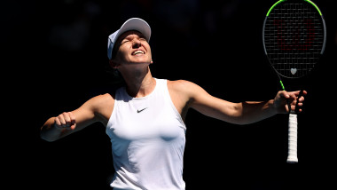 MELBOURNE, AUSTRALIA - JANUARY 29: Simona Halep of Romania celebrates winning match point during her Women's Singles Quarterfinal match against Anett Kontaveit of Estonia on day ten of the 2020 Australian Open at Melbourne Park on January 29, 2020 in Melbourne, Australia. (Photo by Clive Brunskill/Getty Images)