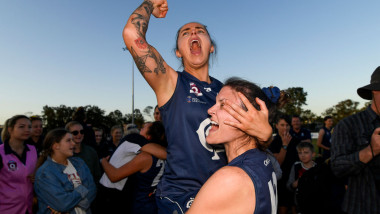Abby Reynolds and Jessica Wuetschner of Coorparoo celebrate after their team's victory in the WQAFL Grand Final match between Bond University and Coorparoo at Leyshon Park on August 25, 2019 in Brisbane, Australia